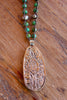 Long Hand Carved Bone "Guadalupe" and Hand Knotted Turquoise Necklace