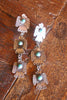 Long Signed Navajo (Dine) Sterling and Turquoise Thunderbird earrings